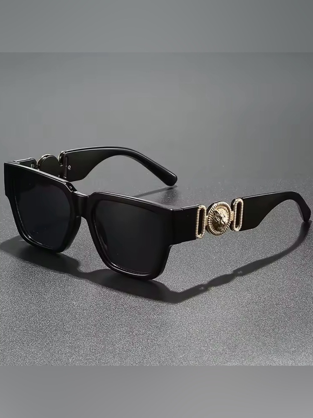 Men's Black Sunglasses with Gold Medallion Accent